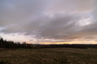 20:01 MEZ - leichte Rotfärbung durch die Wolken